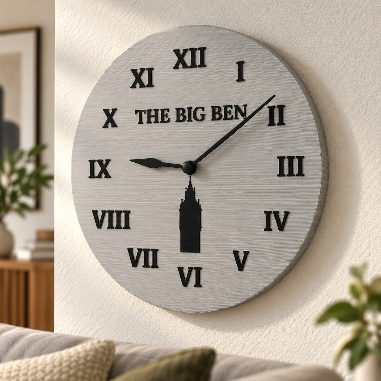 A light-colored wall clock with black Roman numerals and The Big Ben lettering in a living room